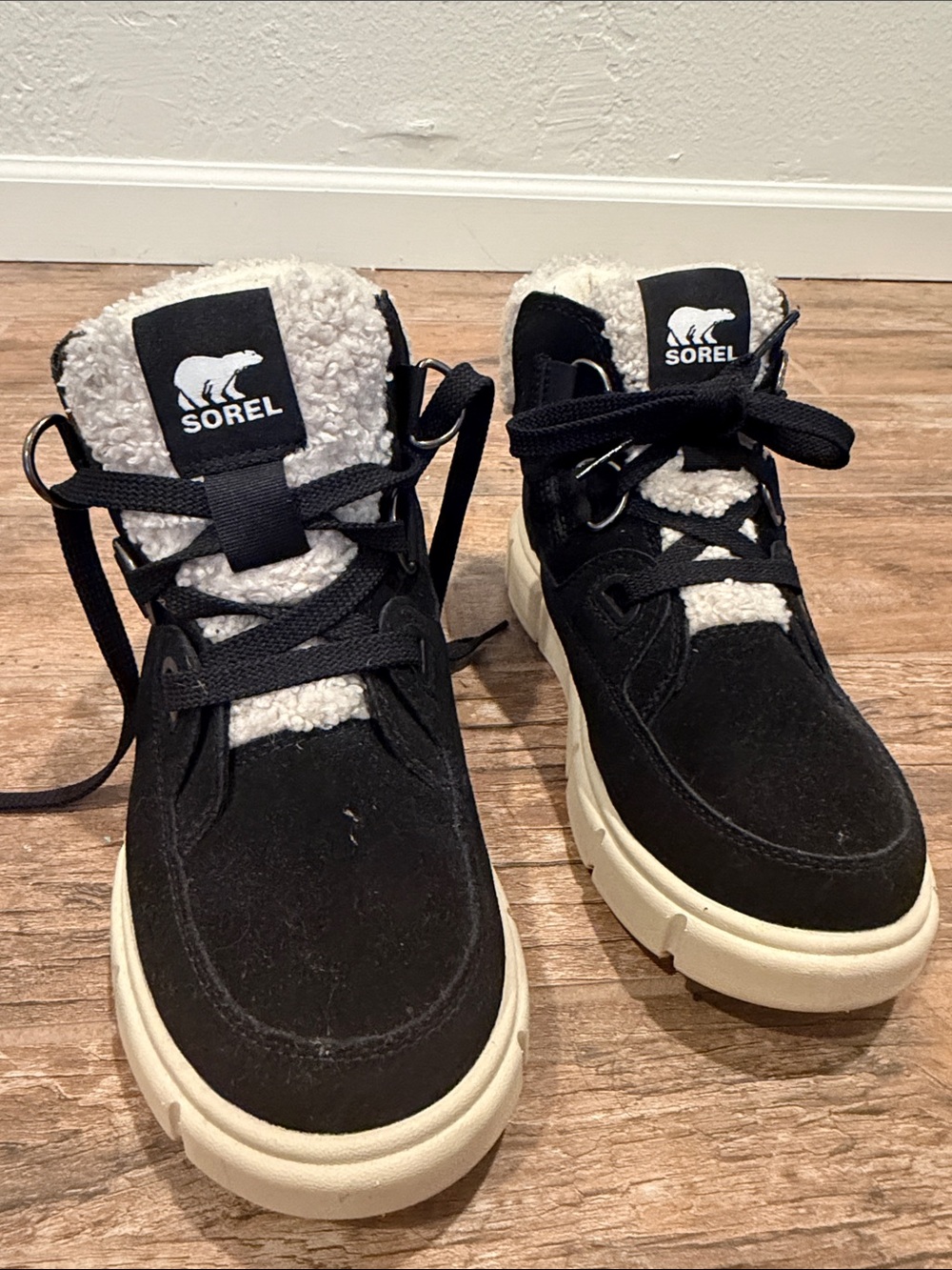 Sorel women’s  Black Suede Sherpa-Lined Boots with Cream Sole